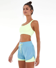 Load image into Gallery viewer, Model Front: Alto Giro Fitness Haut Top Blackout Sustentacao E Silk Amarelinho Lime